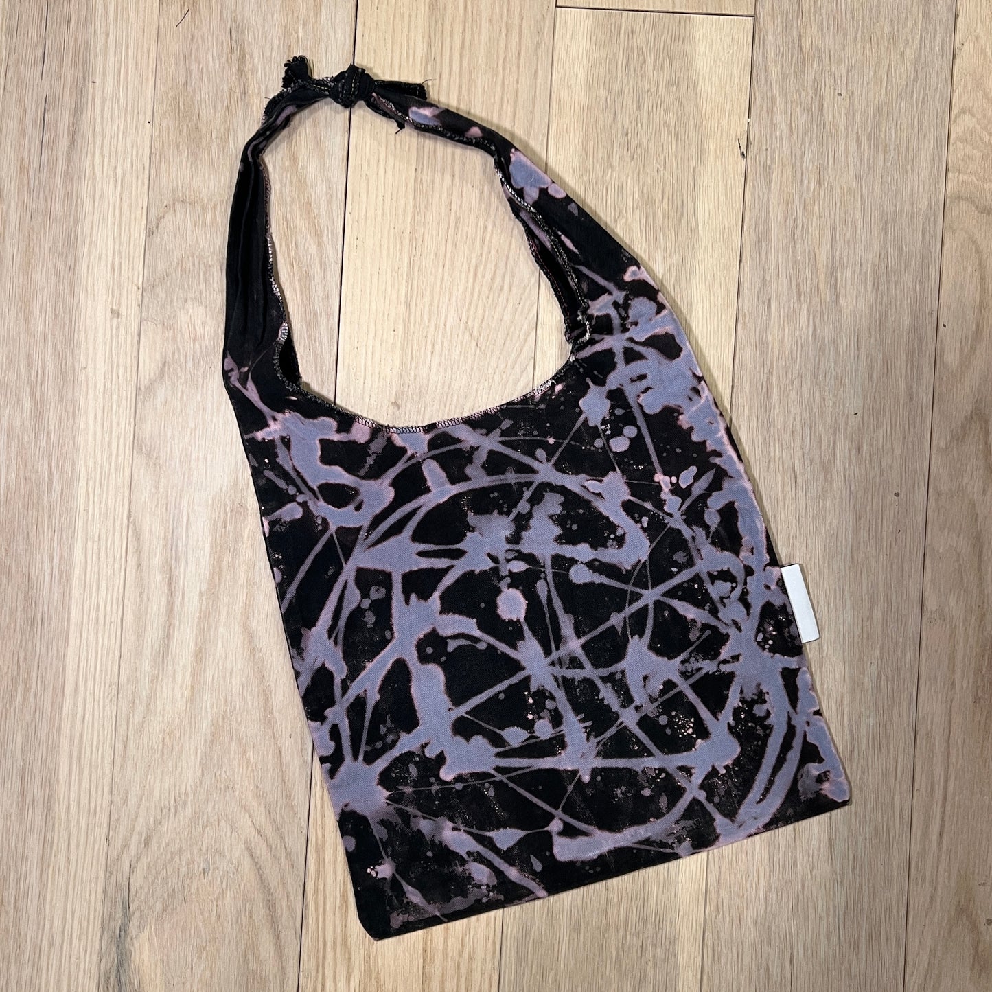 splashed sling bag