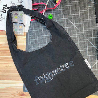 embroidered sling bag